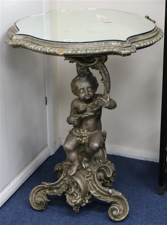 A painted occasional table with figural stem and mirrored top H.85cm